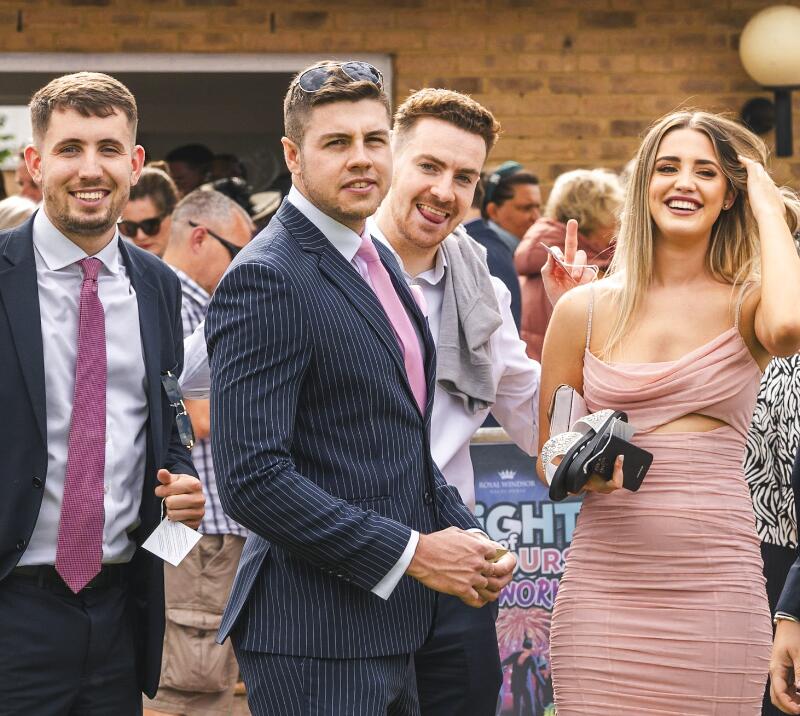 A small group of smartly dressed friends at Windsor Races