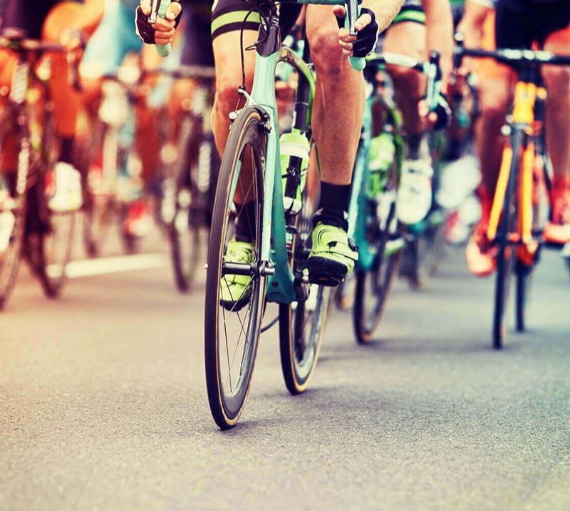 Close up on a group of cyclists.