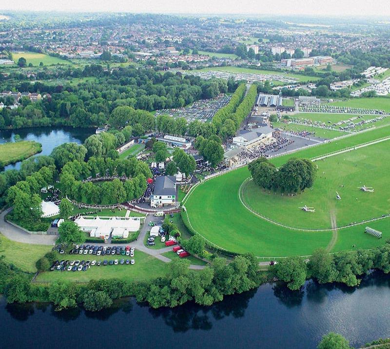 An overhead view of the greenery of Royal Windsor Racecourse.